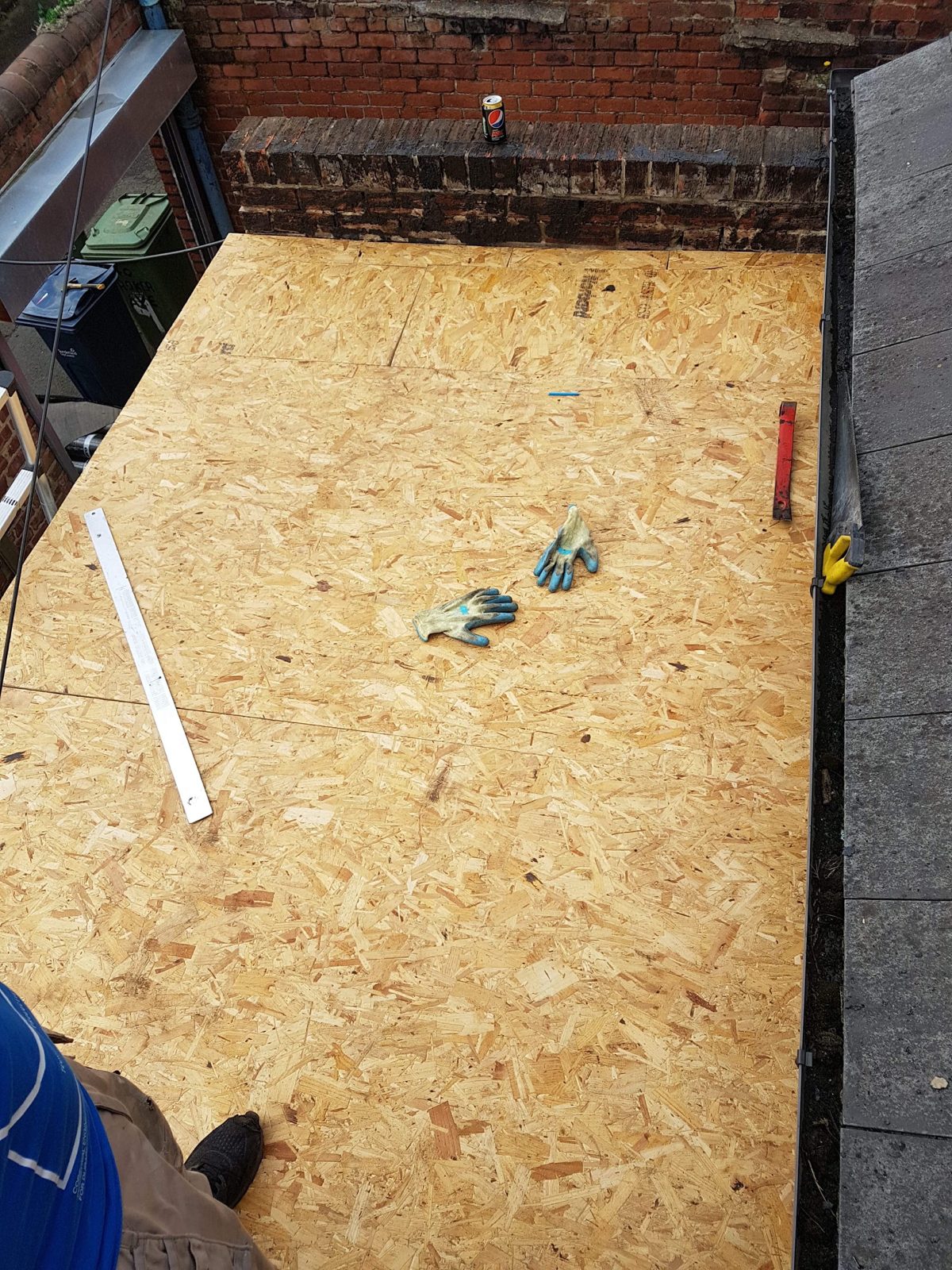 A flat roof with a new timber deck boarded out